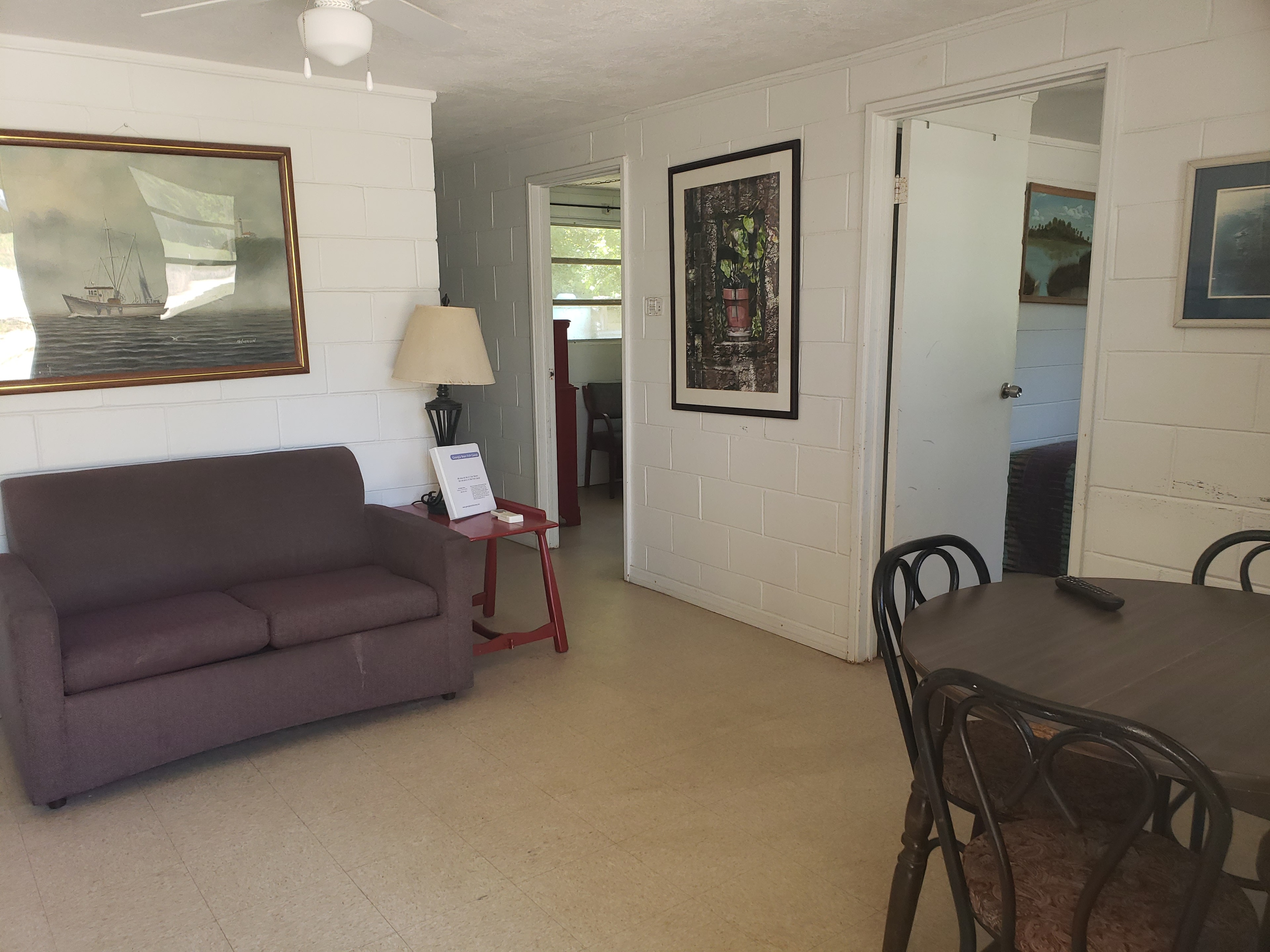 Double Cabin living area with sofa and dining table