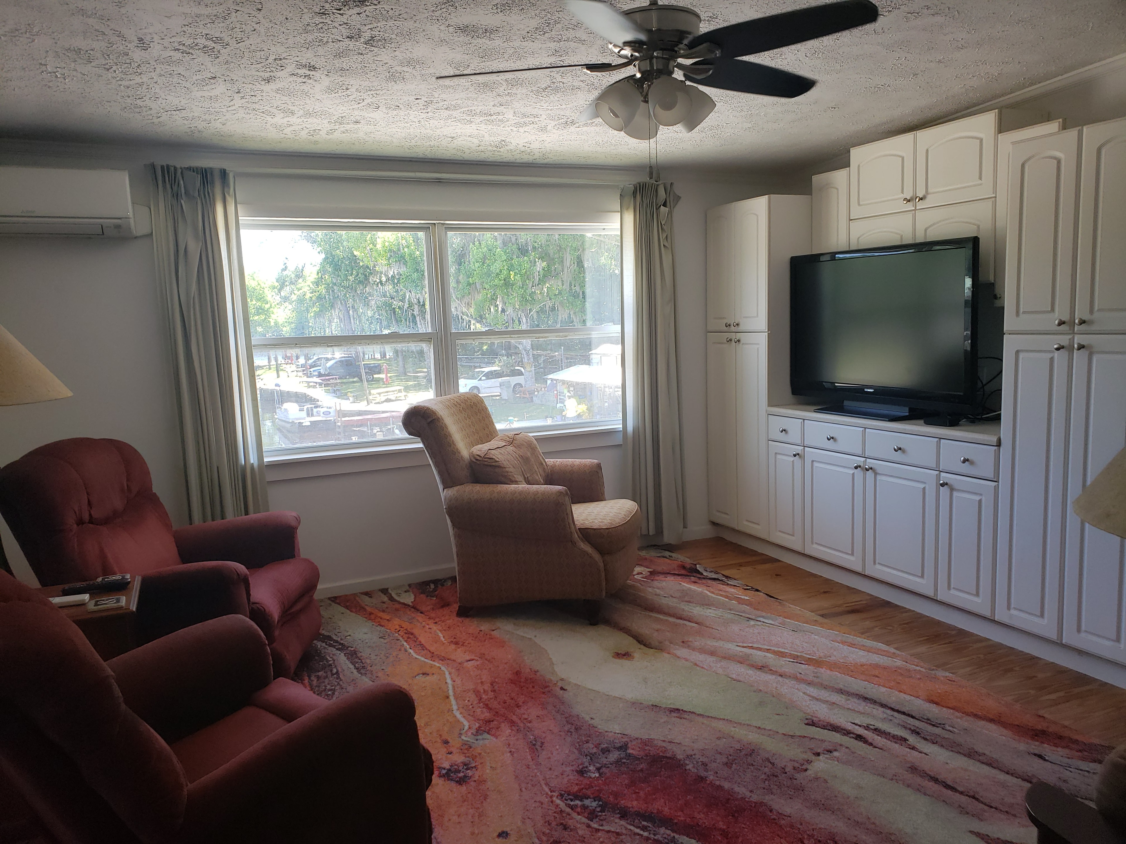 Double Cabin living room with recliners and TV
