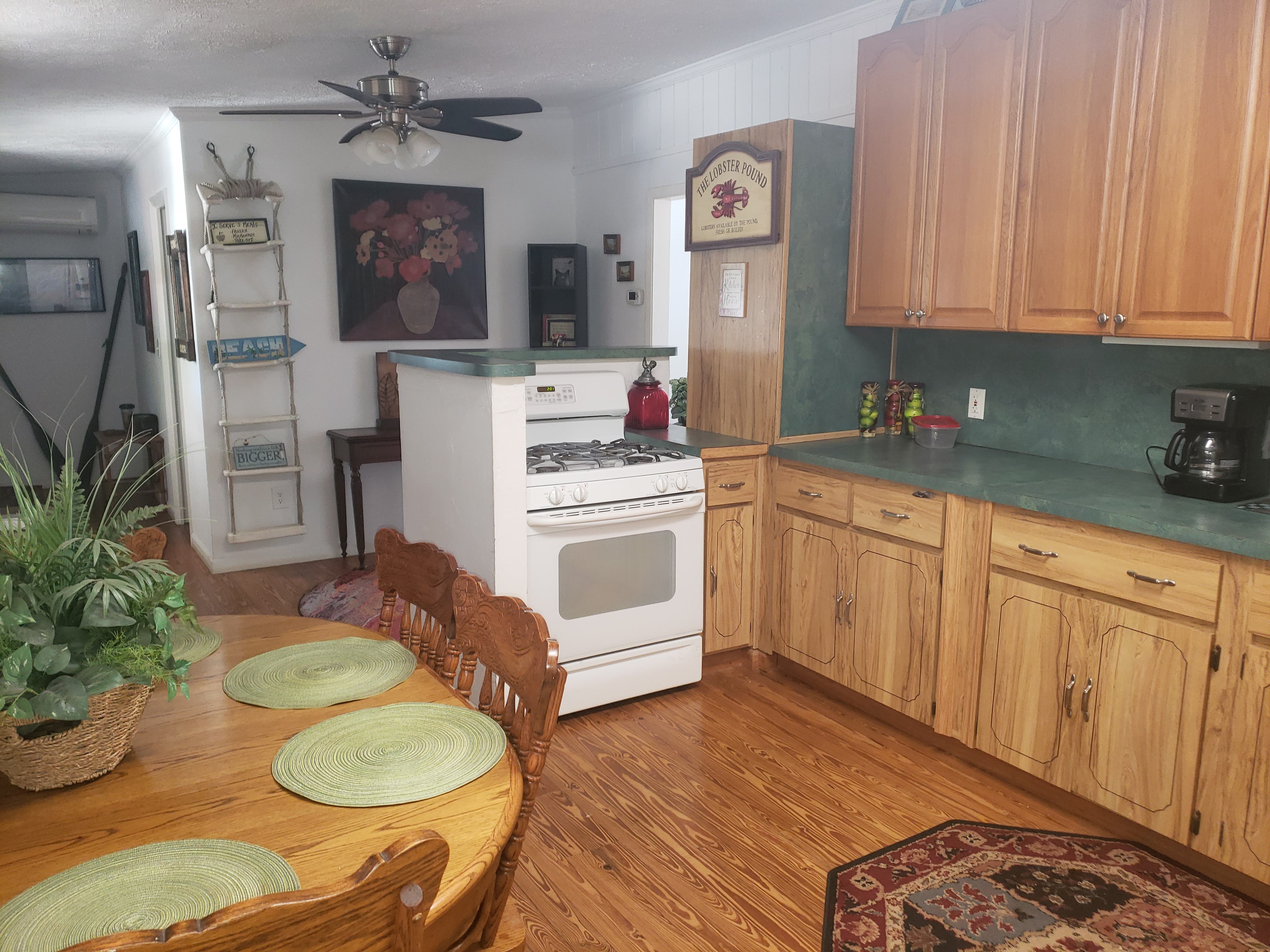 Double Cabin kitchen with gas stove and dining area